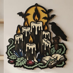 May include: A layered wooden wall art piece featuring black candles with dripping cream wax, a yellow moon, black bats, a black raven on a post, an open book, green thorny vines, and blue and red crystals. The design uses a dark, multi-layered aesthetic.