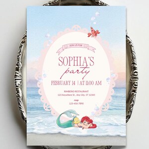May include: A rectangular party invitation card featuring a watercolor ocean scene with a mermaid and a crab. The text reads: JOIN US FOR SOPHIA'S party FEBRUARY 14 | AT 11:00 AM RIMBERIO RESTAURANT 123 Anywhere St., Any City, ST 12345 rsvp 123-456-7890.