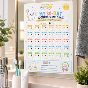 May include: A white rectangular 30-day toothbrushing chart featuring a cartoon tooth, a sun, and colorful boxes for morning and night tracking. The text reads Little Smile Co. MY 30-DAY TOOTHBRUSHING CHART, Let's make brushing a happy habit!, and I DID IT!