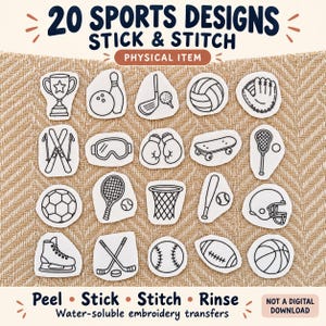 May include: A set of 20 white stick and stitch embroidery transfers featuring black line art sports designs including a trophy, bowling ball, golf club, volleyball, baseball glove, skis, goggles, boxing gloves, skateboard, lacrosse stick, soccer ball, tennis racket, basketball hoop, baseball bat, football helmet, ice skate, hockey sticks, baseball, football, and basketball.