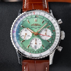 Vintage Breitling Navitimer 1 B01 Chronograph STICKERS 3/2023 Steel Green Dial
