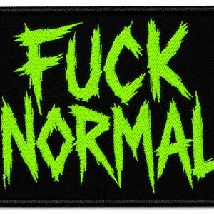 May include: A rectangular embroidered patch with a black background and the text FUCK NORMAL stitched in a bright neon green color. The lettering features a jagged, distressed, and sharp-edged font style with a thick black border around the edge.