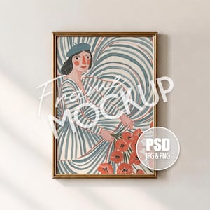 May include: A framed art print featuring a stylized illustration of a person wearing a blue beret and a striped shirt, holding a bouquet of red flowers against a swirling blue and white background. The frame is gold and the text reads Frame MOCKUP.