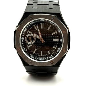 May include: A black analog-digital wristwatch with an octagonal bezel featuring exposed screws. The dark dial has a textured grid pattern, luminous hands, and a sub-dial. The watch includes a black metal link bracelet and a digital display window.
