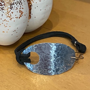 Hammered metal and leather bracelet rustic oval rectangle