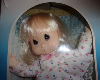 dolls with big heads and little bodies