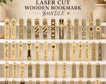 May include: A collection of rectangular wooden bookmarks featuring various laser-cut designs, including floral patterns, geometric shapes, and text such as "BUNNY," "Be kind," and "Dream Big." The bookmarks are arranged in rows on a white shelf.
