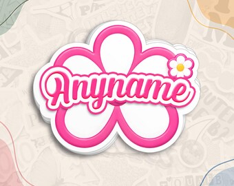 May include: A custom sticker featuring a white flower shape with a thick pink outline. The word Anyname is written in a pink cursive font across the center. A small white flower with a yellow center is attached to the top right petal.