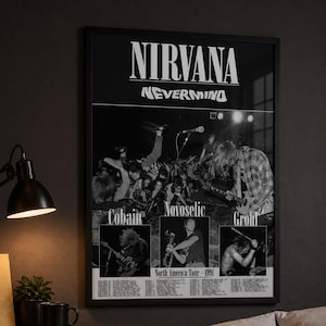 May include: A black and white framed poster featuring the band Nirvana. The top displays the text NIRVANA and NEVERMIND. Below is a concert photograph, three individual band member portraits labelled Cobain, Novoselic, and Grohl, and a list of North America Tour 1991 dates.