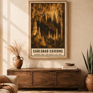 May include: A vertical rectangular wall art print featuring a detailed illustration of the Carlsbad Caverns with golden stalactites and stalagmites against a dark background. The text reads CARLSBAD CAVERNS NATIONAL PARK NEW MEXICO EST. 1930.