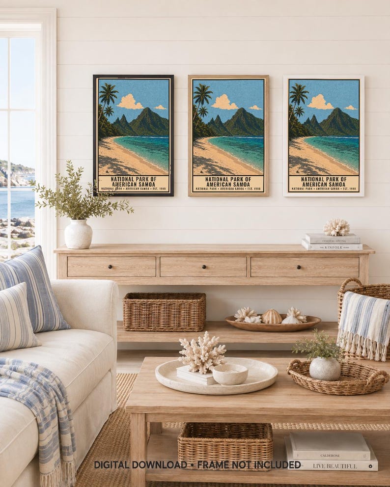 May include: Three vertical wall art prints depicting the National Park of American Samoa with palm trees, a sandy beach, and mountains. Each print features the text National Park of American Samoa, American Samoa, Est. 1988 in black frames.
