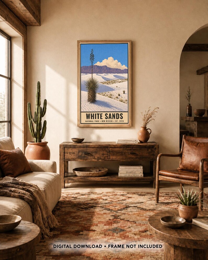 May include: A vertical rectangular wall art print featuring a landscape of White Sands National Park in New Mexico. The illustration depicts white gypsum dunes, a tall yucca plant, purple mountains, and a blue sky. Text reads WHITE SANDS.