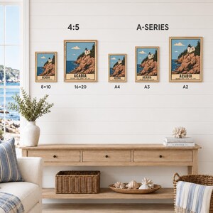 May include: Five framed wall art prints of Acadia National Park displayed on a wall, labeled with sizes 8x10, 16x20, A4, A3, and A2. The prints feature a lighthouse on a rocky cliffside by the ocean. Text reads: DIGITAL DOWNLOAD - FRAME NOT INCLUDED.