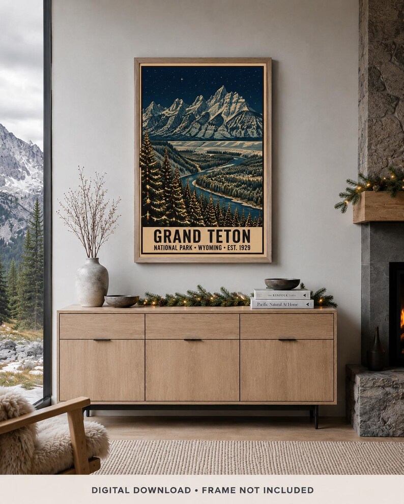 May include: A vertical wall art print featuring a nighttime landscape of the Grand Teton National Park in Wyoming. The illustration depicts snow-capped mountains under a starry sky, a winding river, and pine trees. Text reads GRAND TETON NATIONAL PARK WYOMING EST. 1929.