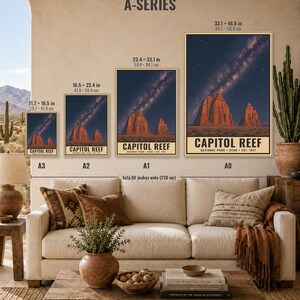 May include: Four framed wall art prints labeled A-Series, ranging from A3 to A0 sizes, depicting the Capitol Reef National Park at night with a starry sky over rock formations. Dimensions are listed in inches, and text reads Capitol Reef National Park Utah Est. 1971.