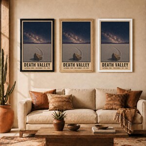 May include: Three vertical wall art prints of Death Valley National Park, California, featuring a desert landscape with a sliding rock under a starry night sky. Each print includes the text DEATH VALLEY NATIONAL PARK CALIFORNIA EST. 1994.