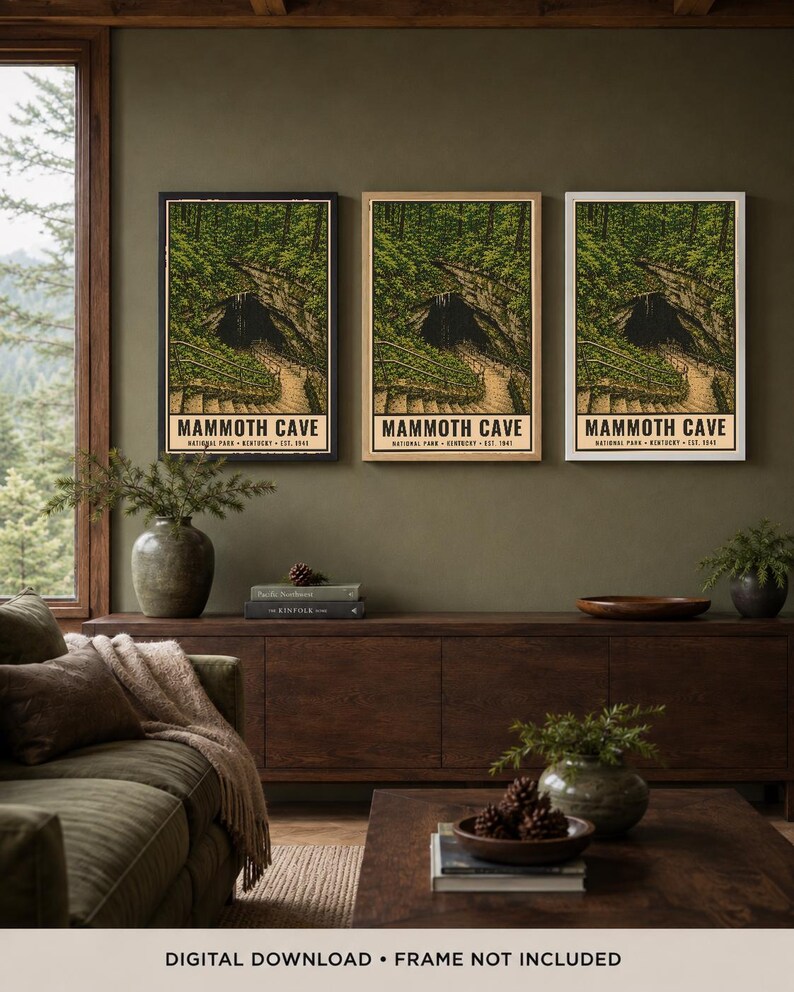 May include: Three vertical rectangular wall art prints featuring a detailed illustration of Mammoth Cave National Park in Kentucky, established in 1941. The artwork depicts a dark cave entrance surrounded by lush green trees and a stone staircase.