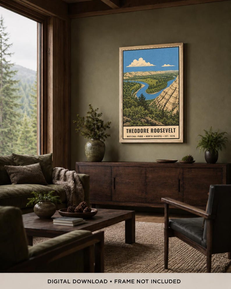 May include: A vertical rectangular wall art print featuring a landscape illustration of Theodore Roosevelt National Park in North Dakota. The artwork depicts a winding blue river, green trees, and tan rock formations under a blue sky with clouds.