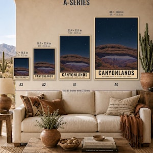 May include: Four vertical wall art prints of Canyonlands National Park at night, labeled A3, A2, A1, and A0. Sizes range from 11.7 x 16.5 inches to 33.1 x 46.8 inches. Each print features a dark starry sky over a natural rock arch formation.
