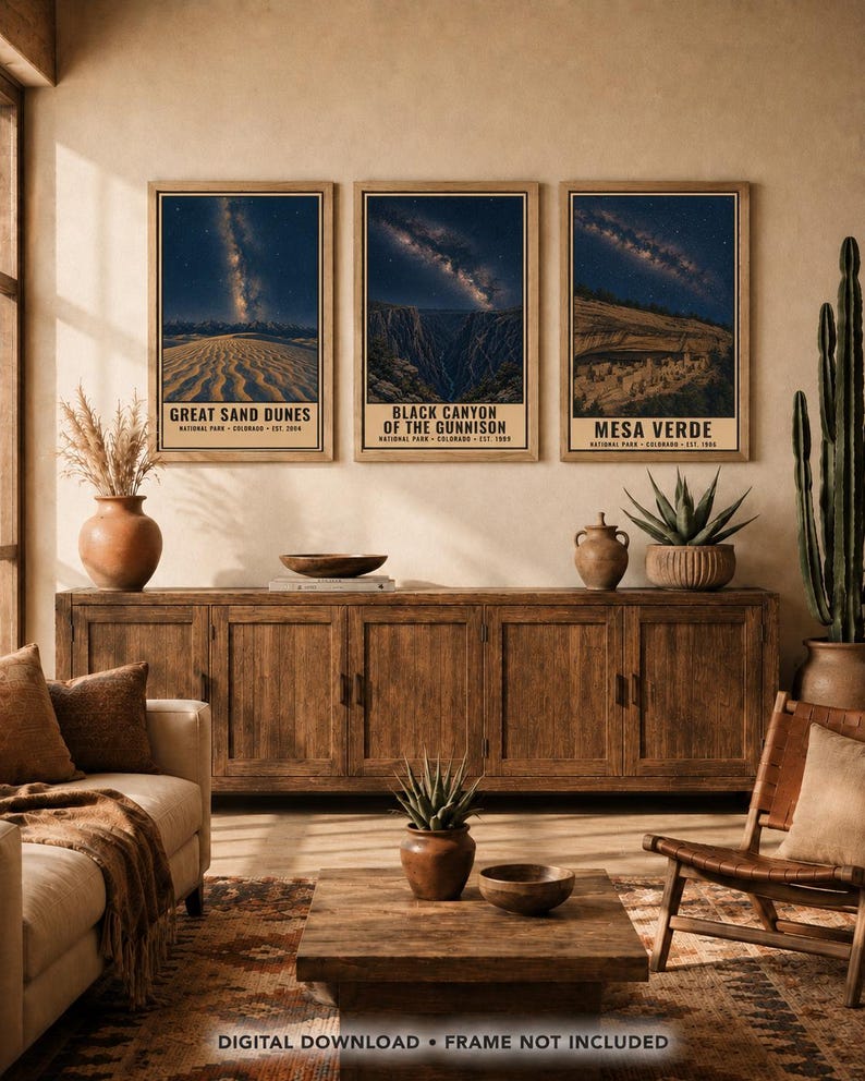 May include: Three rectangular wall art prints featuring night sky landscapes of Great Sand Dunes, Black Canyon of the Gunnison, and Mesa Verde National Parks. Each print displays a starry galaxy above the park terrain with text labels below.