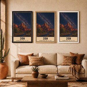 May include: Three identical vertical wall art prints featuring a night landscape of Zion National Park with a starry sky, red rock mountains, and a river. Each print includes the text ZION NATIONAL PARK UTAH EST. 1919 at the bottom.