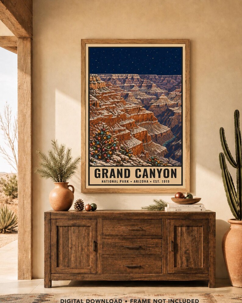 May include: A framed vertical poster depicting the Grand Canyon in Arizona under a starry night sky. The canyon walls are dusted with snow, and a decorated Christmas tree with colorful lights stands in the foreground. Text reads GRAND CANYON.