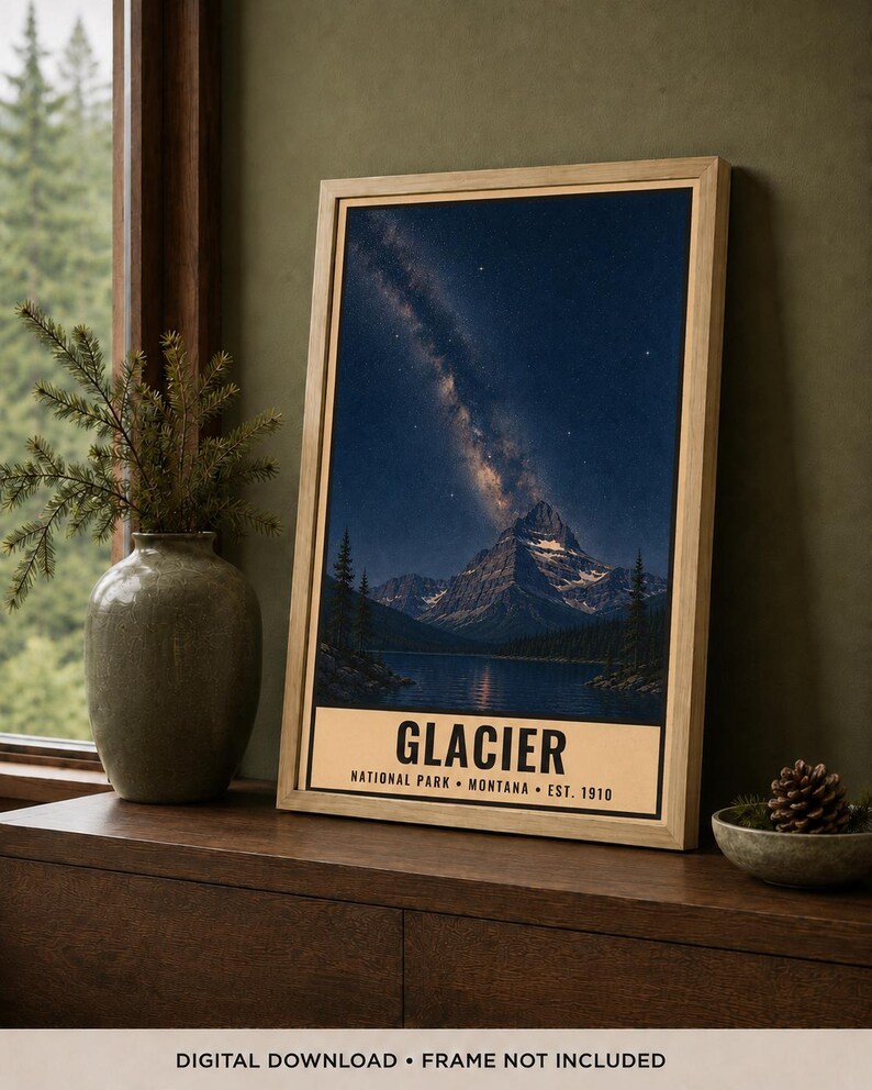 May include: A framed vertical wall art print featuring a night landscape of a mountain peak reflected in a lake under a starry sky with the Milky Way visible. The bottom border contains the text GLACIER NATIONAL PARK MONTANA EST. 1910.