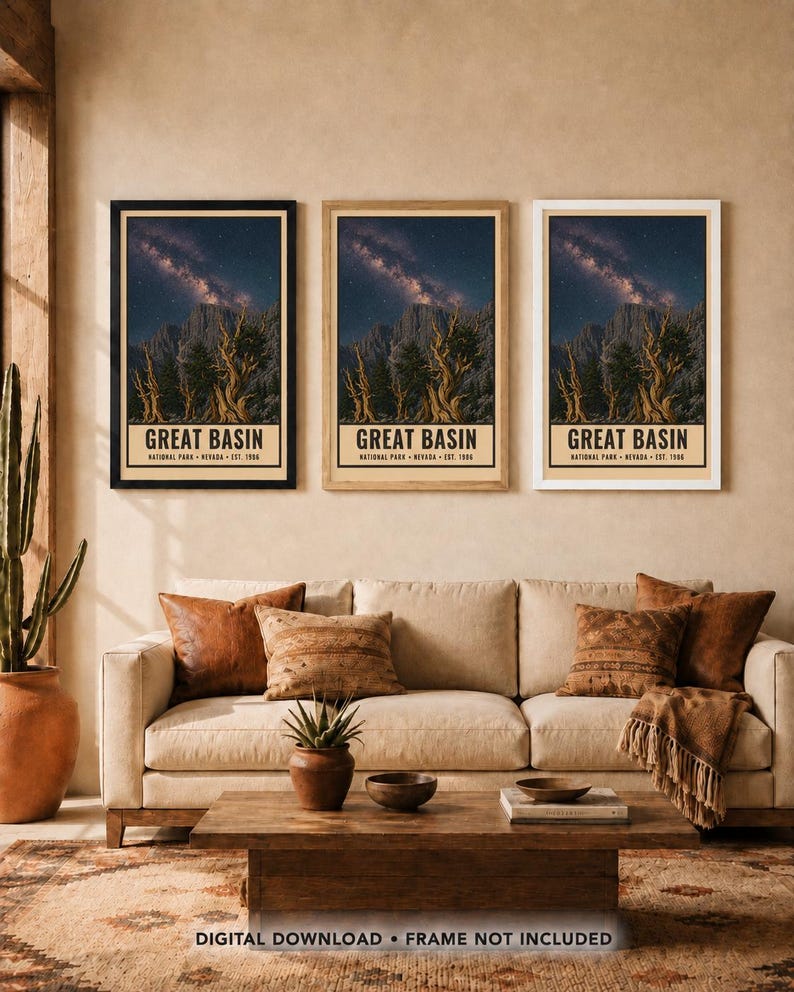 May include: Three vertical posters featuring a night sky with a milky way galaxy over mountain peaks and ancient trees. Each poster displays the text GREAT BASIN NATIONAL PARK NEVADA EST. 1986. The posters are shown in black, wood, and white frames.