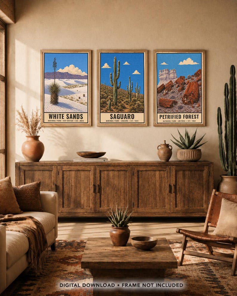 May include: Three rectangular wall art prints featuring illustrations of White Sands, Saguaro, and Petrified Forest National Parks. Each print displays a blue sky, landscape scenery, and the park name in bold black text at the bottom of the frame.