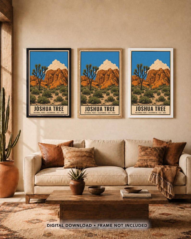 May include: Three vertical wall art prints featuring a Joshua Tree National Park landscape with orange rock formations, green desert vegetation, and a blue sky. Each print displays the text JOSHUA TREE NATIONAL PARK CALIFORNIA EST. 1994.