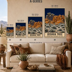 May include: A series of four vertical posters labeled A3, A2, A1, and A0, depicting a Joshua Tree National Park landscape with orange rock formations, desert plants, and a dark blue starry sky. Each poster includes the text JOSHUA TREE NATIONAL PARK CALIFORNIA EST. 1994.