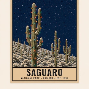May include: A poster featuring a night scene of saguaro cacti in a snowy desert landscape, decorated with colorful string lights under a starry sky. The text reads SAGUARO NATIONAL PARK ARIZONA EST. 1994. DIGITAL DOWNLOAD FRAME NOT INCLUDED.