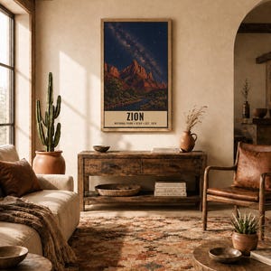 May include: A vertical rectangular wall art print featuring a night landscape of Zion National Park with a starry sky, red rock mountains, and a river. The text at the bottom reads ZION NATIONAL PARK UTAH EST. 1918 in black capital letters.