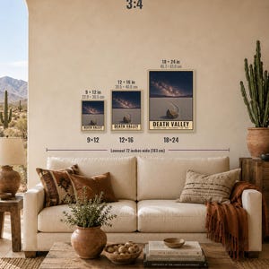 May include: Three vertical wall art prints of Death Valley National Park, each featuring a desert landscape with a sliding rock under a starry night sky. The prints are displayed in 22.9x30.5 cm, 30.5x40.6 cm, and 45.7x61.0 cm sizes above a 183 cm wide sofa.