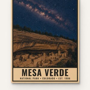 May include: A rectangular poster featuring a night sky filled with stars above the cliff dwellings of Mesa Verde National Park. The text reads MESA VERDE NATIONAL PARK &bull; COLORADO &bull; EST. 1906. Below the poster, the text reads DIGITAL DOWNLOAD &bull; FRAME NOT INCLUDED.