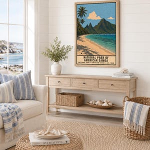 May include: A vertical wall art print featuring a landscape illustration of the National Park of American Samoa with palm trees, mountains, a sandy beach, and blue water. The text reads National Park of American Samoa, Est. 1988.