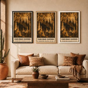 May include: Three vertical posters depicting the interior of Carlsbad Caverns with golden stalactites and stalagmites against a dark background. Each poster features the text: CARLSBAD CAVERNS, NATIONAL PARK, NEW MEXICO, EST. 1930.