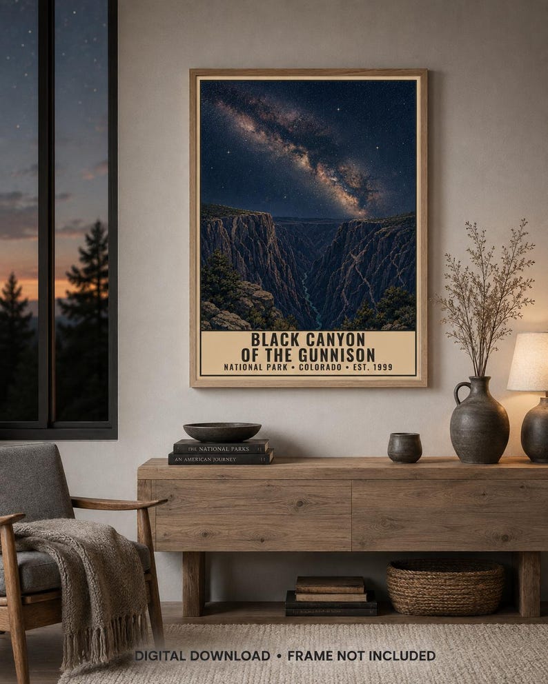 May include: A rectangular wall art print featuring a night sky filled with stars and the Milky Way galaxy above the deep, dark rock formations of the Black Canyon of the Gunnison. The text reads BLACK CANYON OF THE GUNNISON NATIONAL PARK COLORADO EST. 1999.