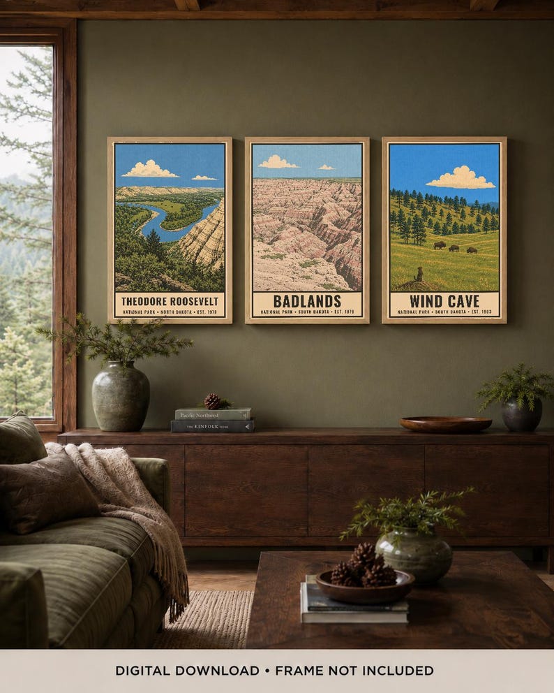 May include: Three vertical rectangular wall art prints featuring illustrations of Theodore Roosevelt, Badlands, and Wind Cave National Parks. Each print displays a landscape scene under a blue sky with white clouds and includes text at the bottom.