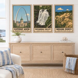 May include: Three framed vertical posters depicting Gateway Arch, Cuyahoga Valley, and Indiana Dunes national parks. Each print features a landscape illustration with text identifying the park, state, and establishment year. The text reads: DIGITAL DOWNLOAD &bull; FRAME NOT INCLUDED.