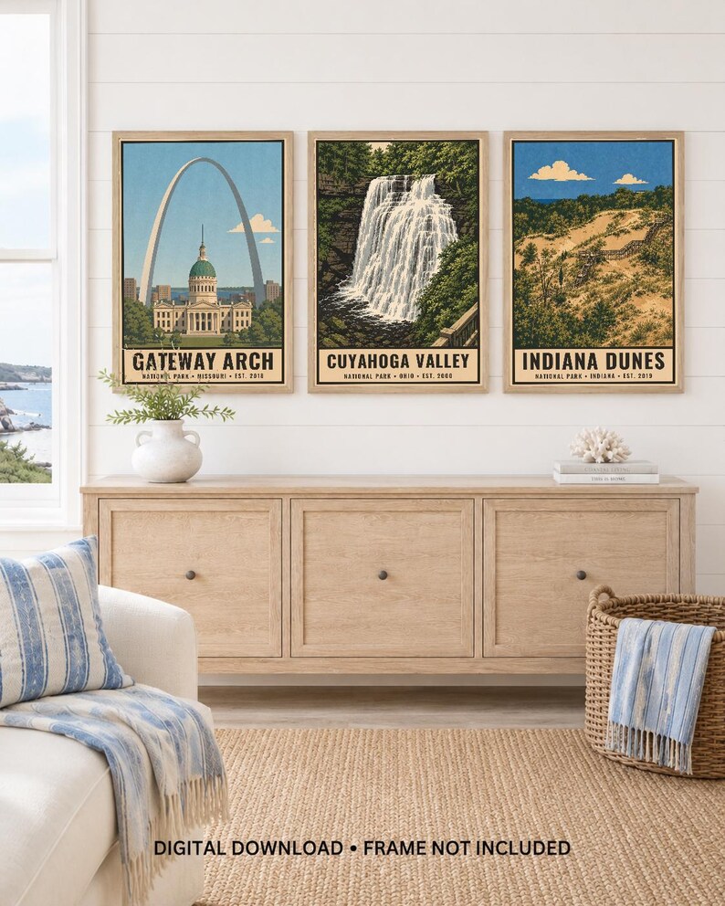 May include: Three framed vertical posters depicting Gateway Arch, Cuyahoga Valley, and Indiana Dunes national parks. Each print features a landscape illustration with text identifying the park, state, and establishment year. The text reads: DIGITAL DOWNLOAD &bull; FRAME NOT INCLUDED.