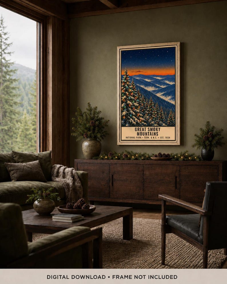 May include: A vertical rectangular wall art print featuring a landscape of the Great Smoky Mountains at twilight. The scene depicts snow-covered pine trees in the foreground, rolling blue mountain ridges, and a vibrant orange sunset sky.