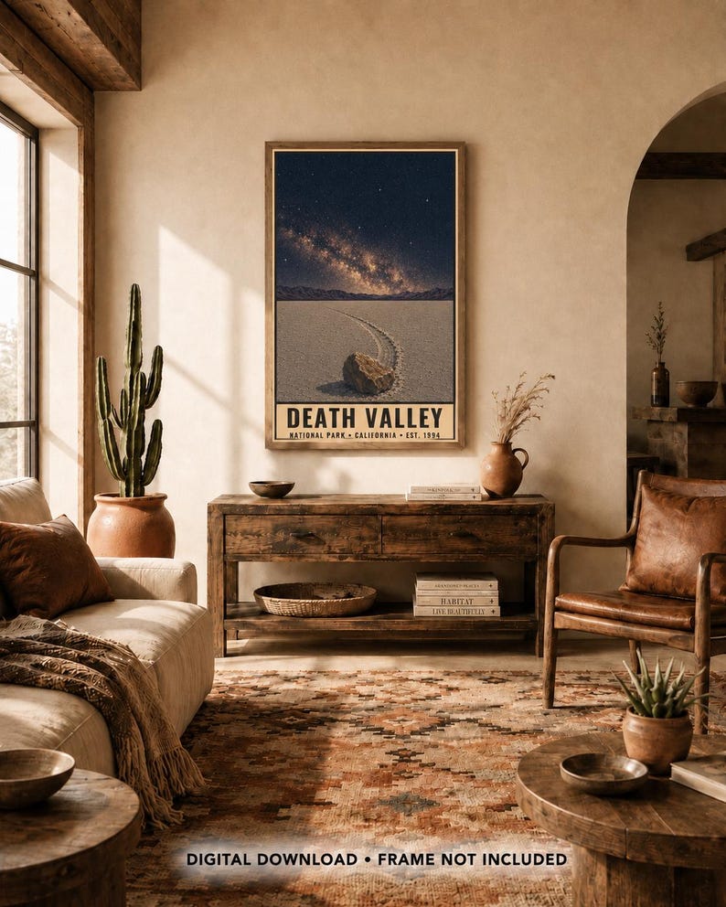 May include: A vertical rectangular wall art print featuring a night sky over Death Valley, California. The image displays a starry sky with a visible Milky Way above a desert landscape with a rock and its trail. The text reads DEATH VALLEY.