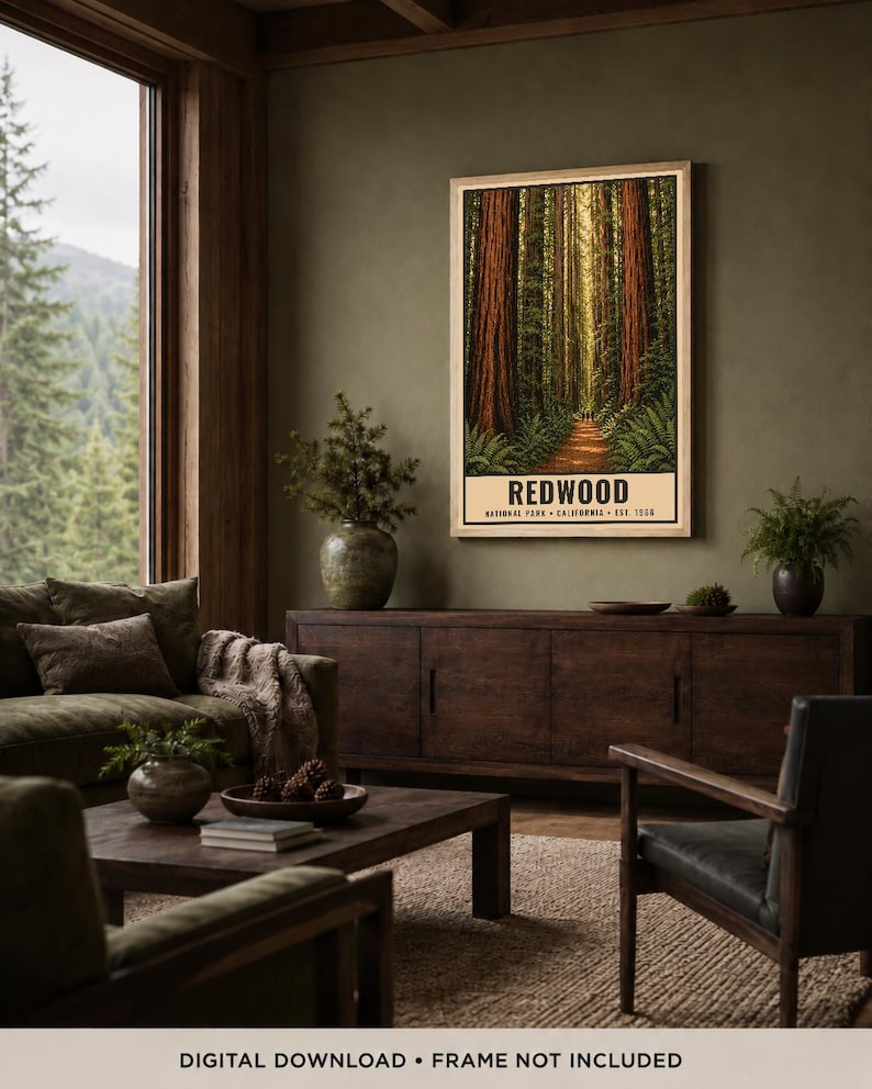 May include: A vertical rectangular wall art print featuring a forest of tall redwood trees with a dirt path leading into the distance. The text at the bottom reads REDWOOD NATIONAL PARK CALIFORNIA EST. 1968 in black capital letters on a cream background.