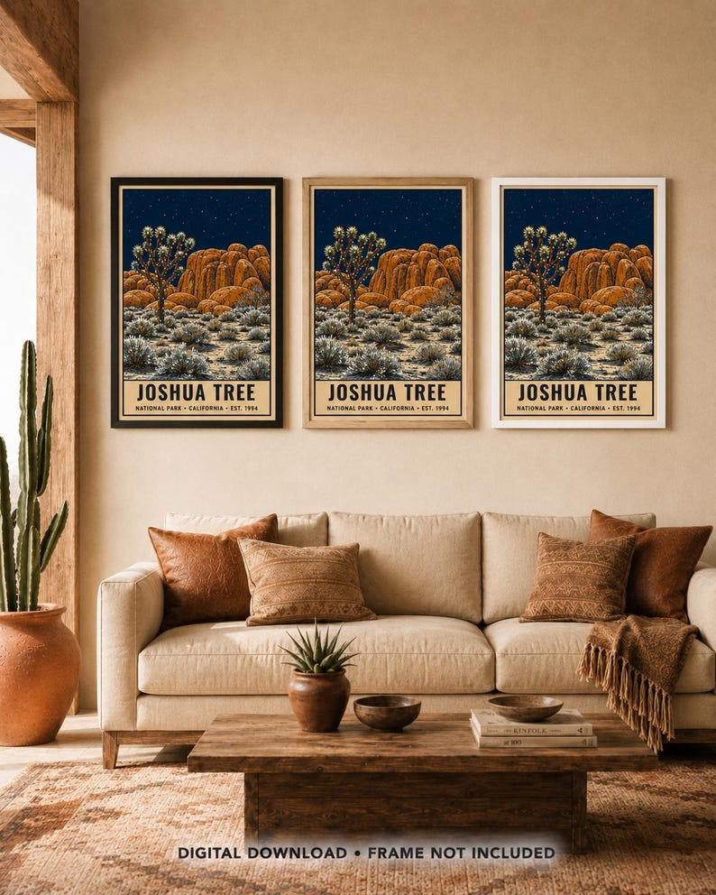 May include: Three identical vertical wall art prints featuring a Joshua Tree National Park landscape at night with orange rock formations, a starry sky, and desert vegetation. Each print includes the text JOSHUA TREE NATIONAL PARK CALIFORNIA EST. 1994.