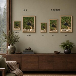 May include: Five framed posters of Mammoth Cave National Park in various sizes labeled 8x10, 16x20, A4, A3, and A2. Each print features a green forest landscape with a dark cave entrance and the text Mammoth Cave National Park. Digital download.