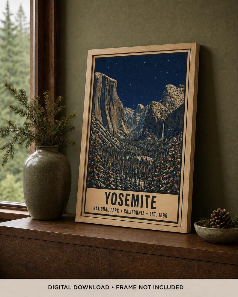 May include: A framed vertical poster featuring a nighttime illustration of Yosemite National Park with snow-capped mountains, a starry sky, and evergreen trees decorated with colorful lights. The text reads YOSEMITE NATIONAL PARK CALIFORNIA EST. 1890.