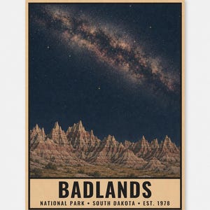 May include: A rectangular poster featuring a night sky filled with stars and the Milky Way galaxy above the layered rock formations of Badlands National Park. The bottom section contains the text BADLANDS NATIONAL PARK SOUTH DAKOTA EST. 1978.