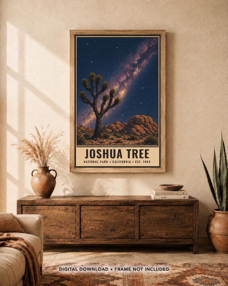 May include: A vertical rectangular wall art print featuring a night sky with a visible Milky Way galaxy above a desert landscape with a Joshua tree and rock formations. The text reads JOSHUA TREE NATIONAL PARK CALIFORNIA EST. 1994.