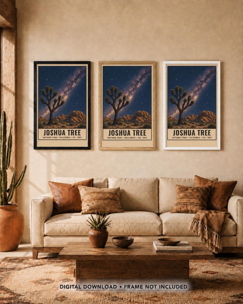 May include: Three vertical wall art prints featuring a Joshua Tree National Park landscape at night with a starry sky and Milky Way. Each print displays the text JOSHUA TREE NATIONAL PARK CALIFORNIA EST. 1994 in a black font on a cream background.